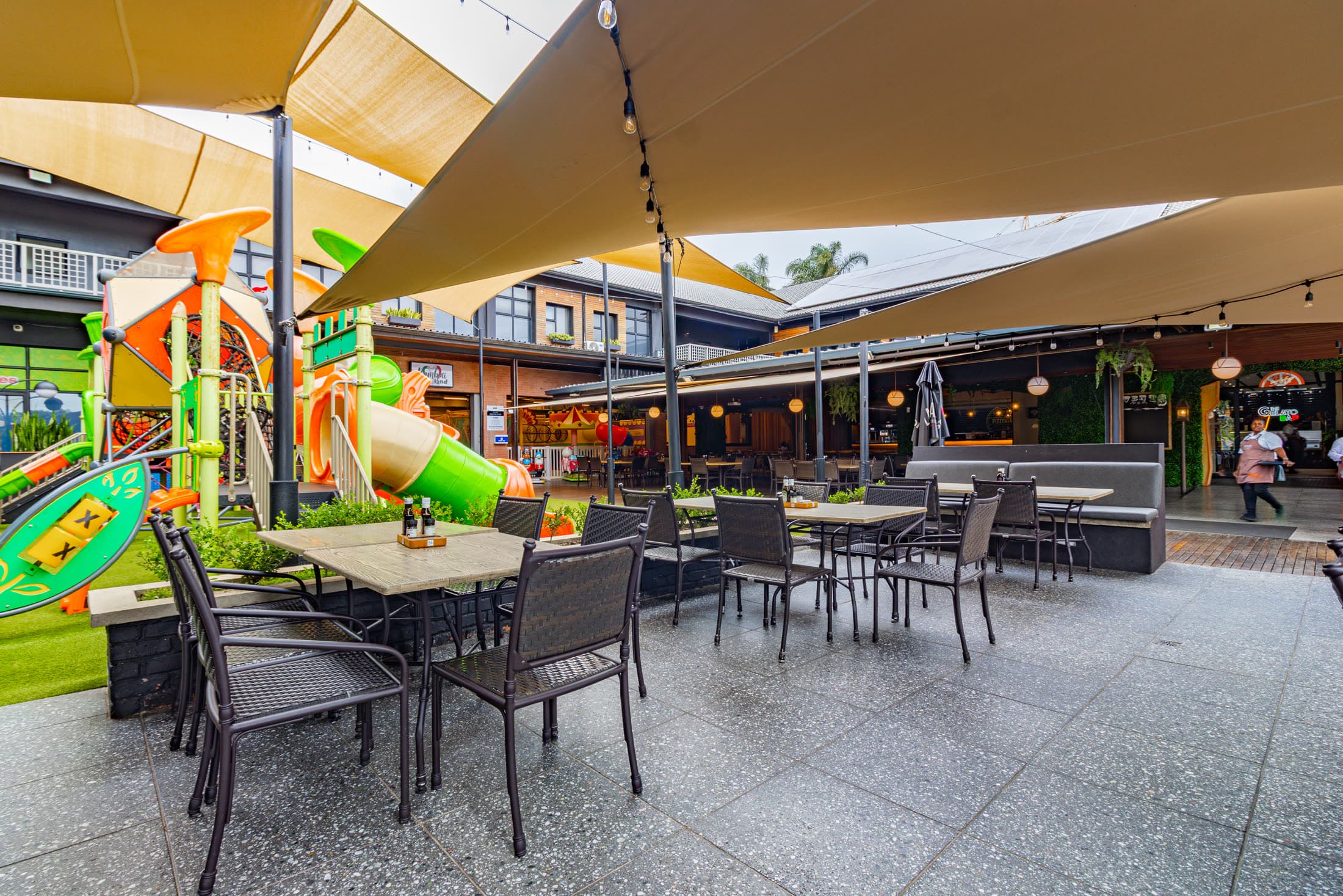 Outside patio dining area with sun protection
