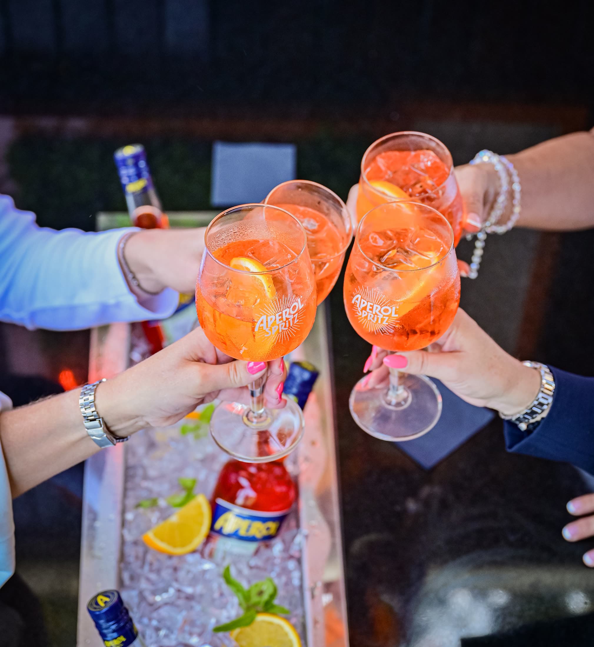 Aperol Spritz toast celebration